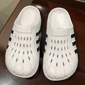 Women’s Adidas Adilette Clogs.